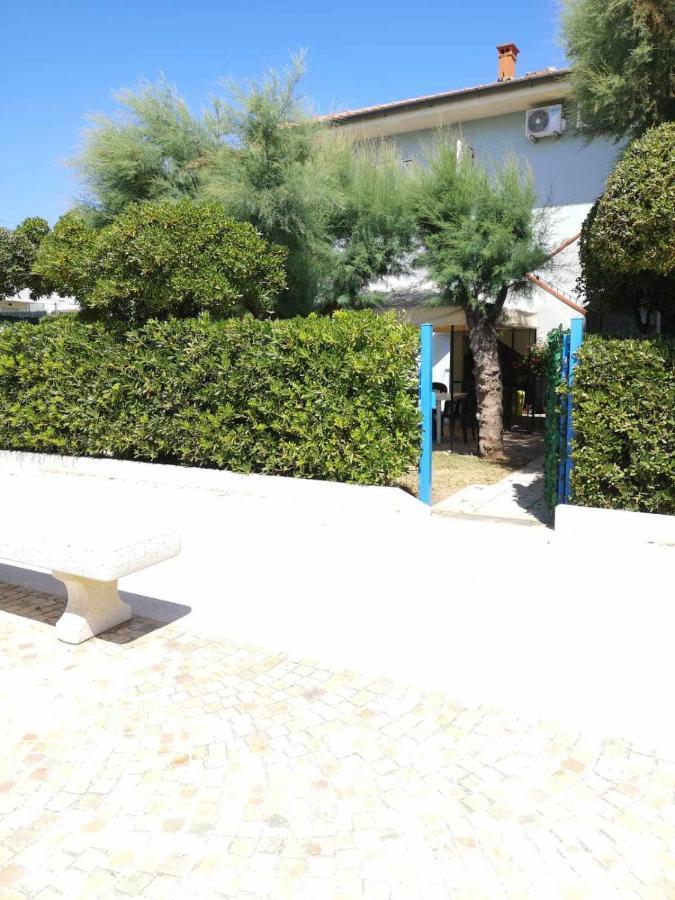 Апартаменты Giardino Sul Mare Casa Casoni Нумана Экстерьер фото